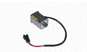 The item shown is a linear solenoid actuator used in textile machinery, specifically for needle selection and pattern control in computerized flat knitting machines.