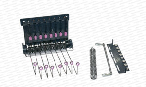 The image shows components of a knitting machine, likely a yarn tensioner assembly or needle selection mechanism