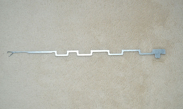 The item pictured is a steel knitting needle designed for industrial circular or hosiery knitting machines.