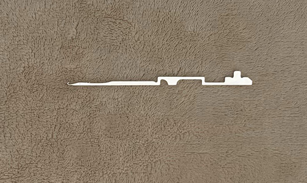 This item is a industrial knitting machine needle, likely a slider or latch needle used in circular knitting machines.