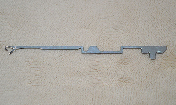 This item is a circular knitting machine needle.
