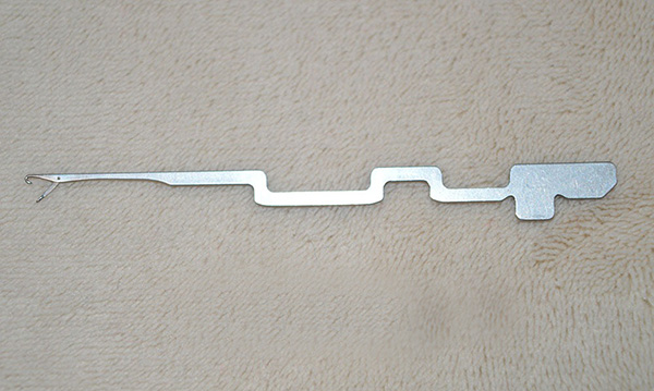 The item shown is a circular knitting machine needle, likely manufactured by brands like ARS or Golden Roc.