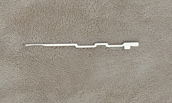 This item is a steel knitting needle designed for industrial circular knitting machines, often used for manufacturing hosiery or textiles.