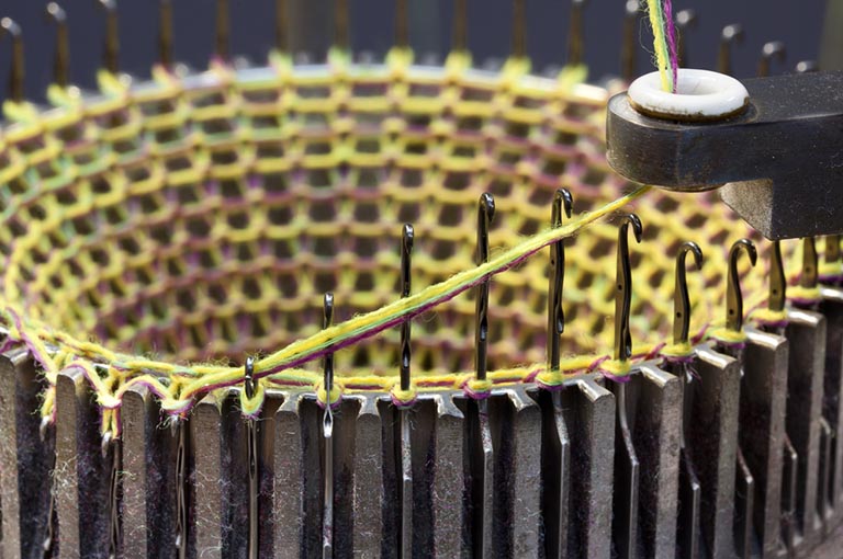 Industrial circular knitting machine front view